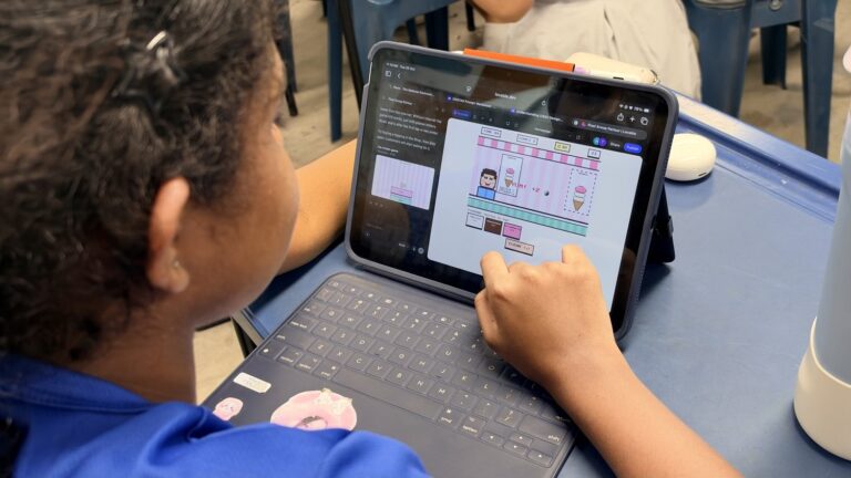 Student refining a game with follow-up prompts