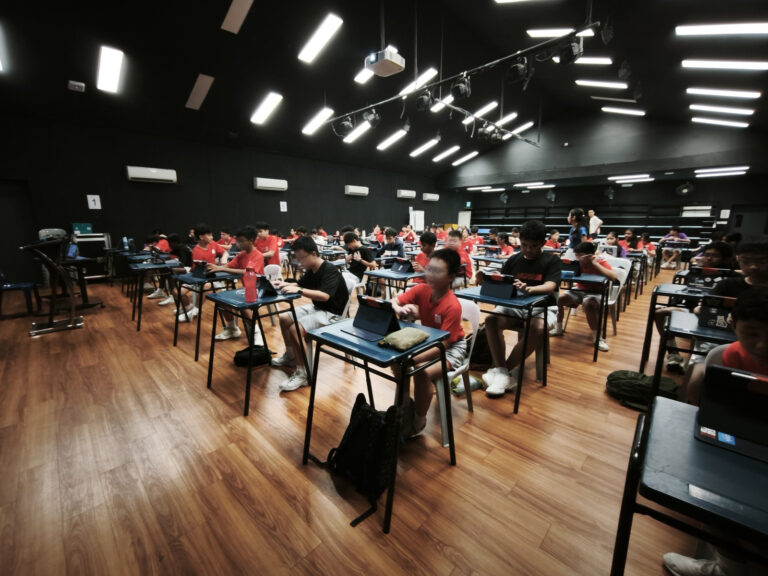 Students building games with AI during the vibe coding workshop