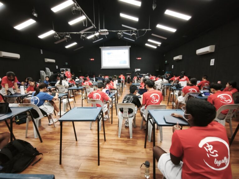 Sec 1 students at work during the Jurong Secondary vibe coding competition