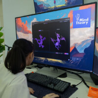 Person works on dragon design at computer with Mind Theory software